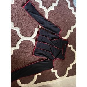 black crop top with red ridged and open sholders